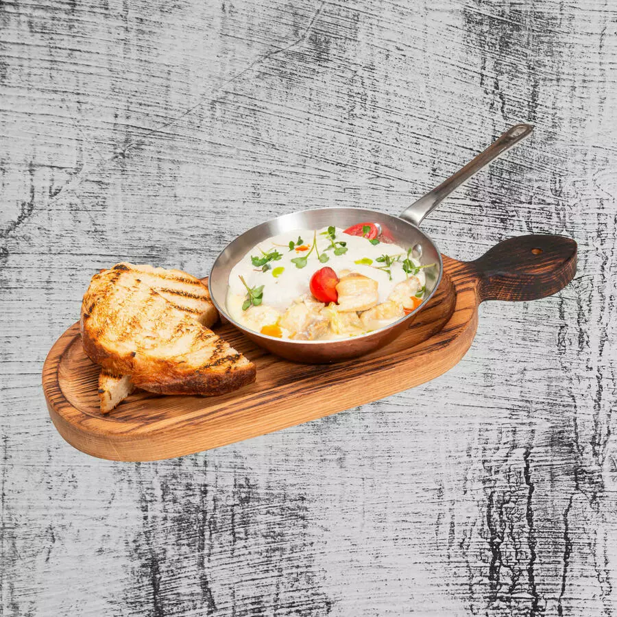 Мясо рапана в сливочном соусе