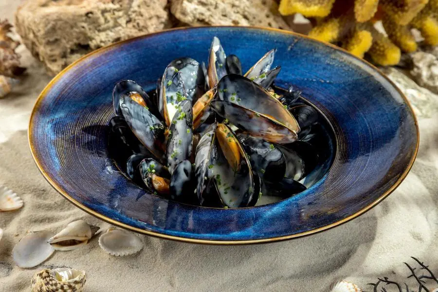 Мидии в чесночно- сырном соусе