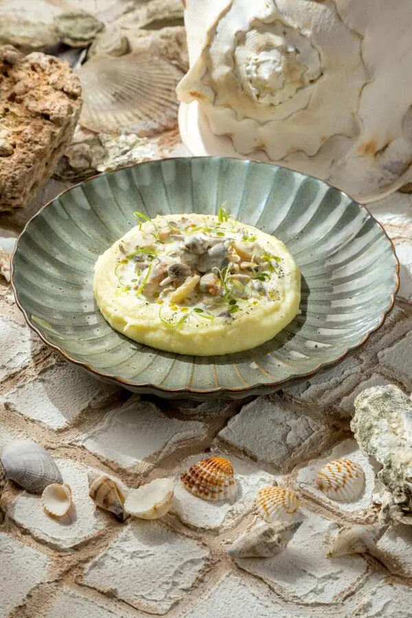 Томленые черноморские рапаны с мидиями