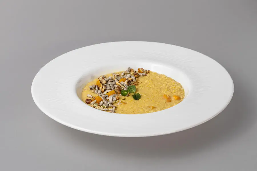 Каша пшенная с тыквой и орехами