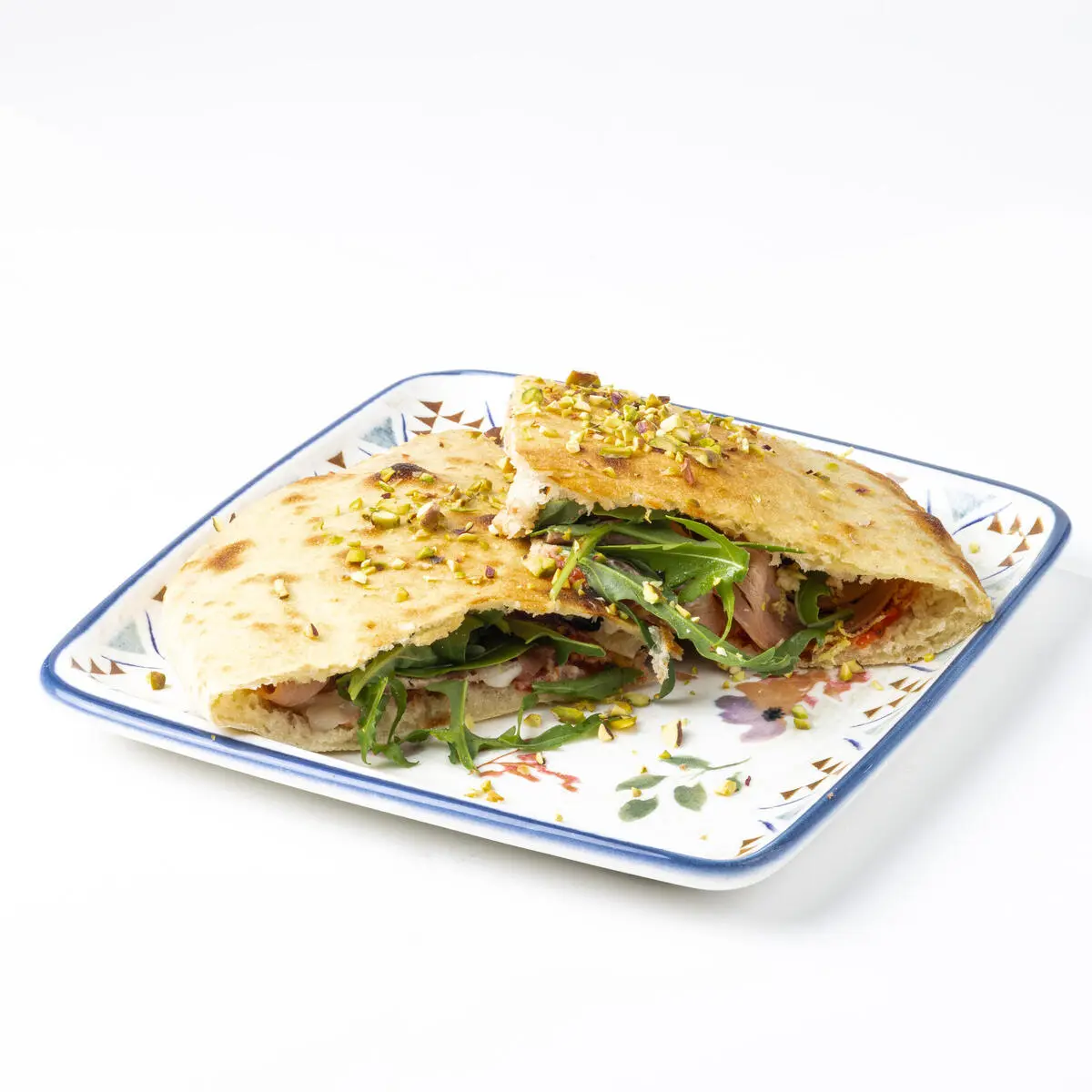 Панини с мортаделлой, фисташками, и рукколой