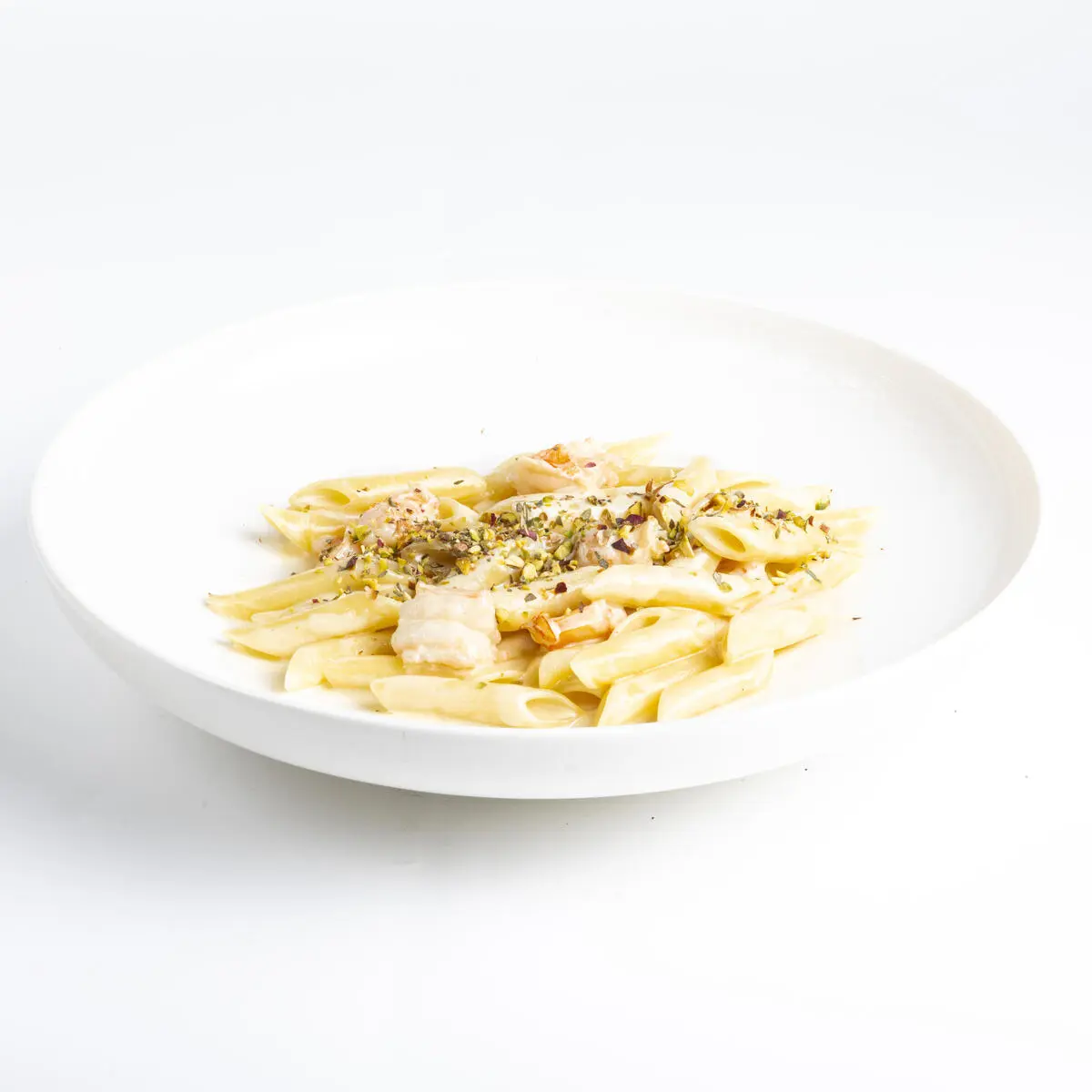 Пенне с креветками и фисташками