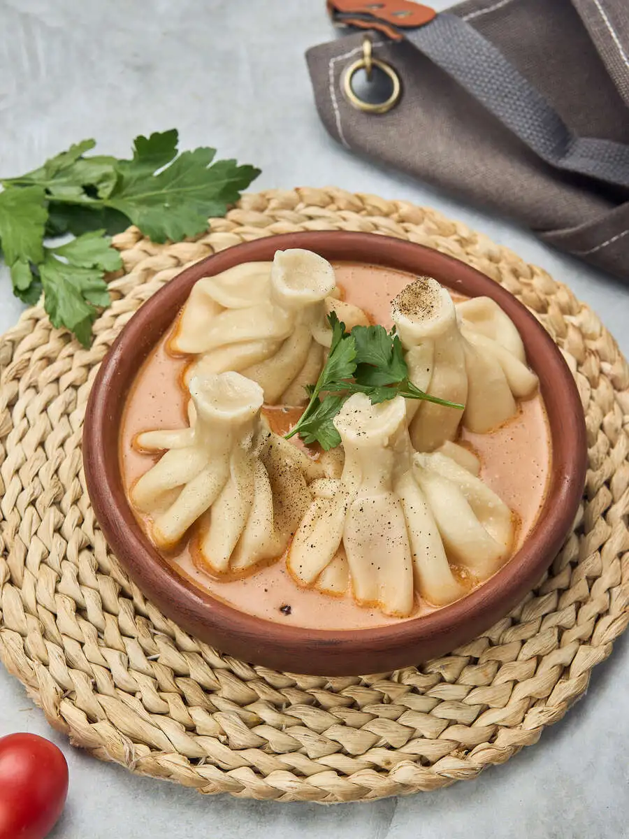 Хинкали в соусе том ям