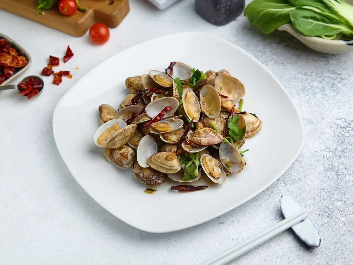 Жареные ракушки 辣炒花蛤  Fried shells