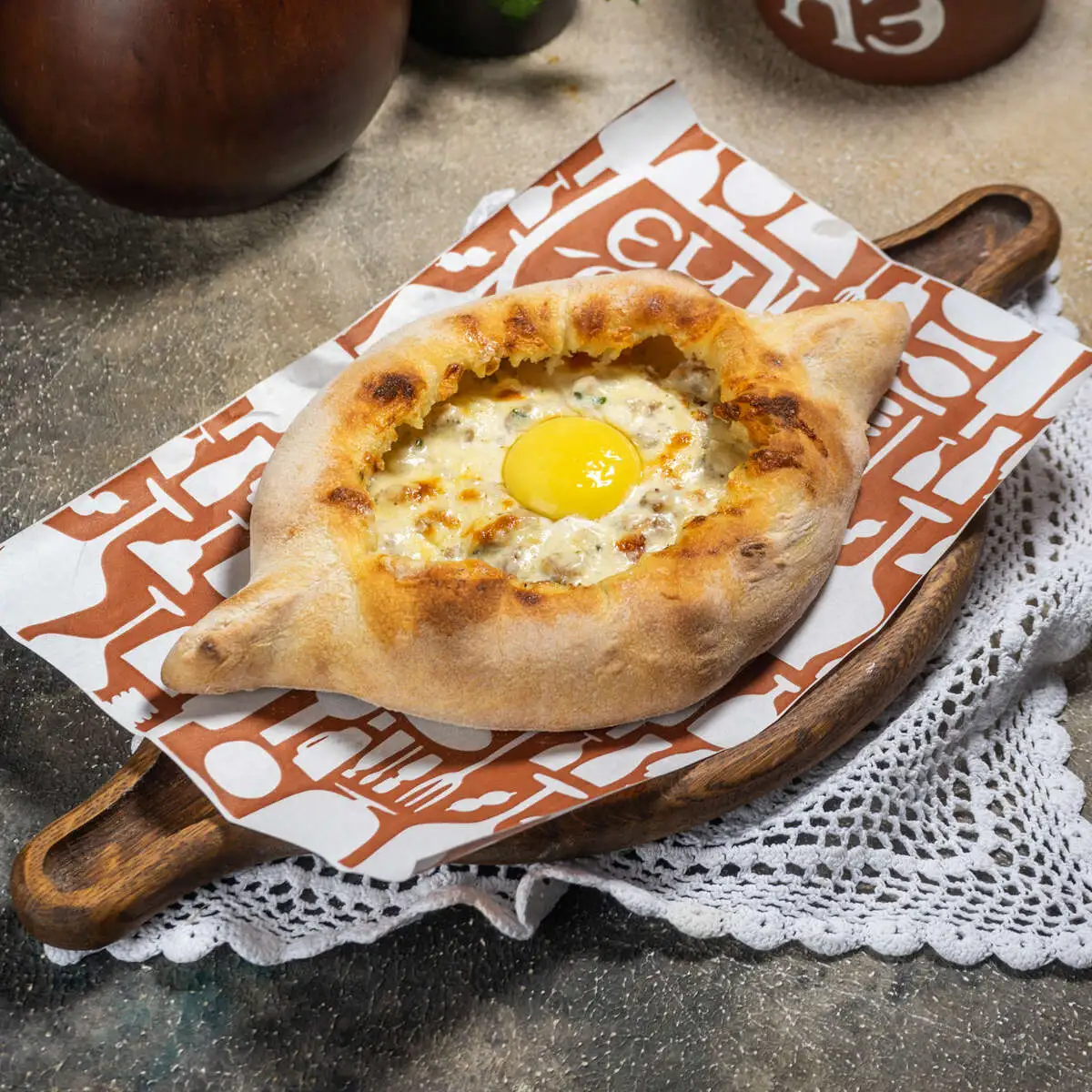 Хачапури по-аджарски с курицей чкмерули