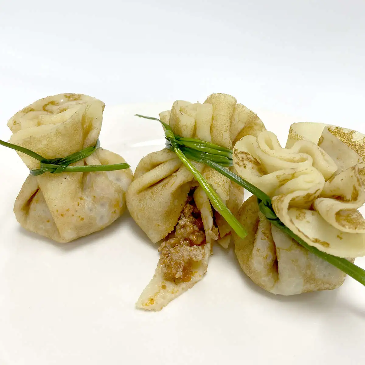 Регаллини с соусом Болоньезе