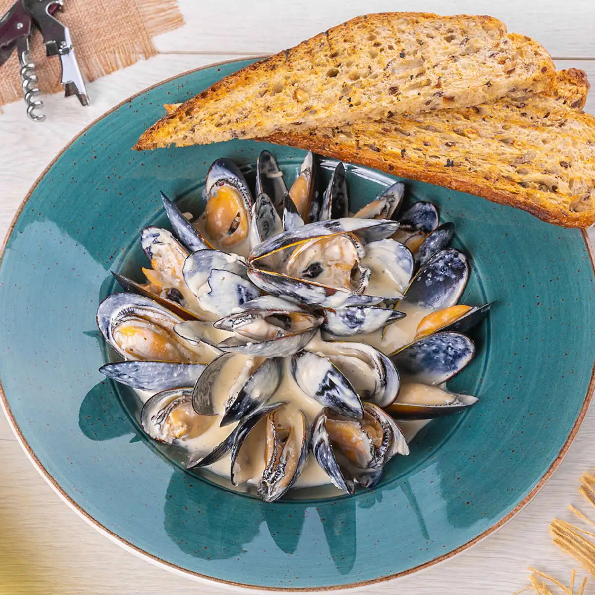 Голубые мидии в сливочно-чесночном соусе