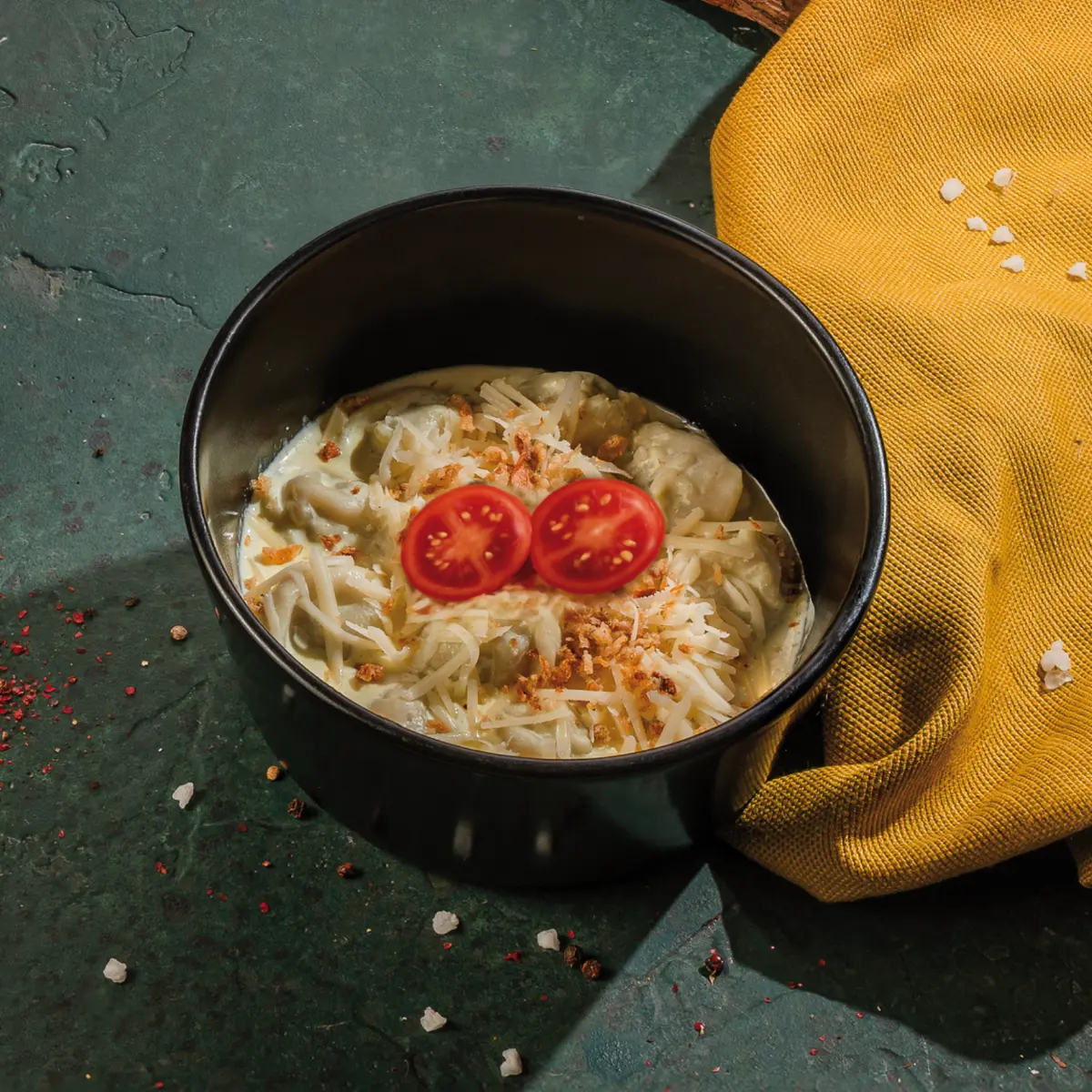 Пельмени в сливочном соусе