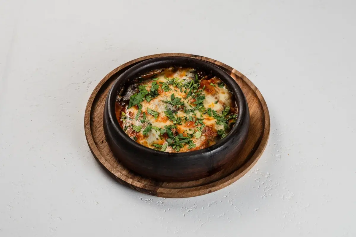 Овощи в кеци под сыром