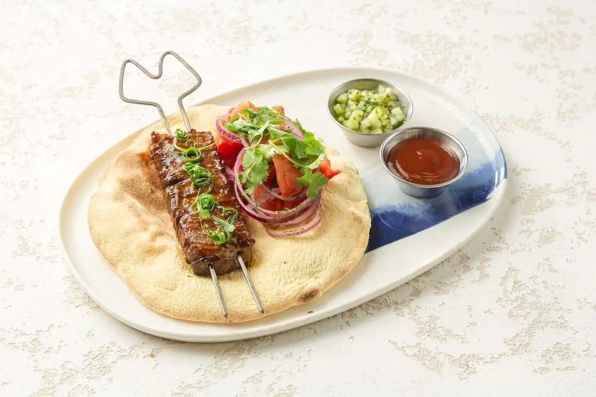 Говяжья лопатка с курдюком на огне