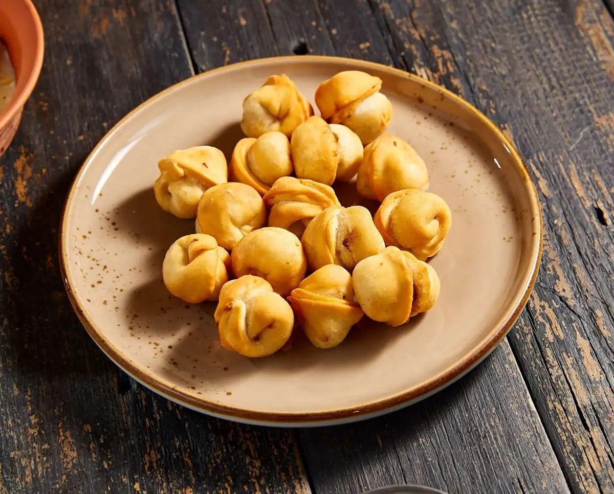 Пельмени жареные