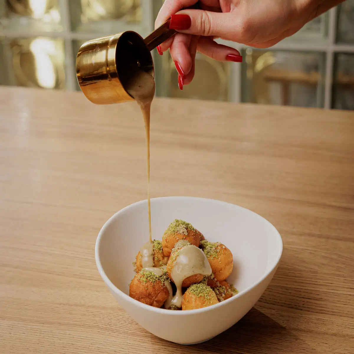 Пончики Лукумадес