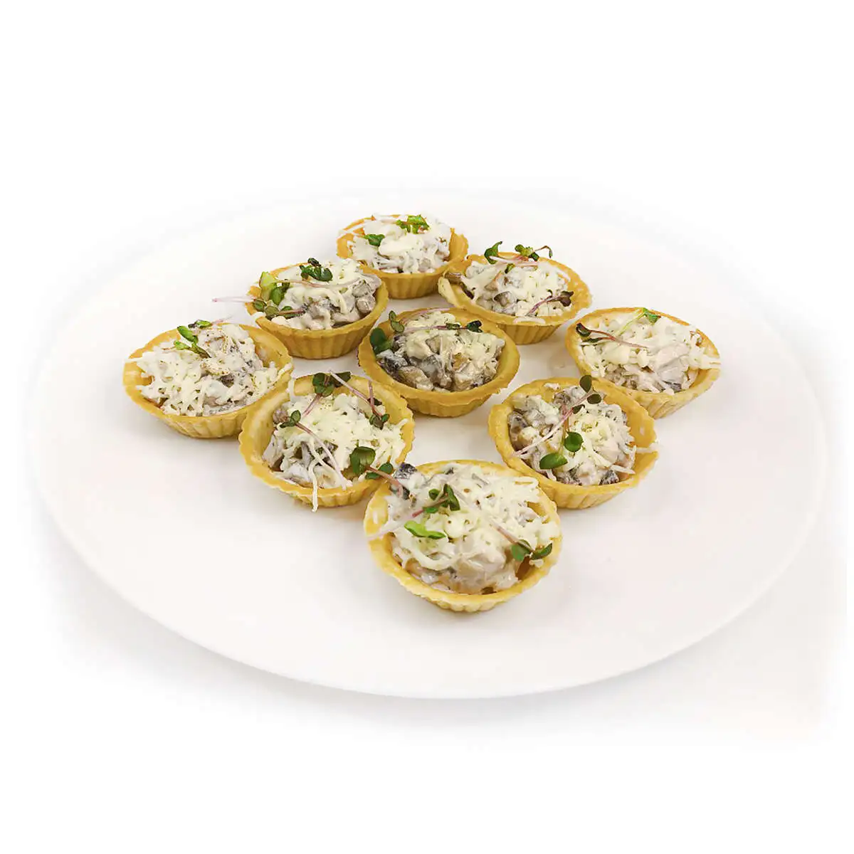 Тарталетки с жульеном из грибов, куриной грудки и сыром