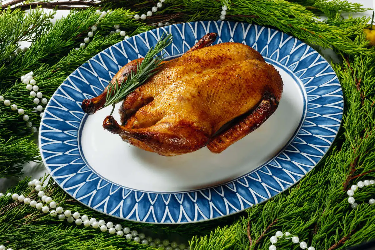 Утка запеченная с яблоками и апельсином