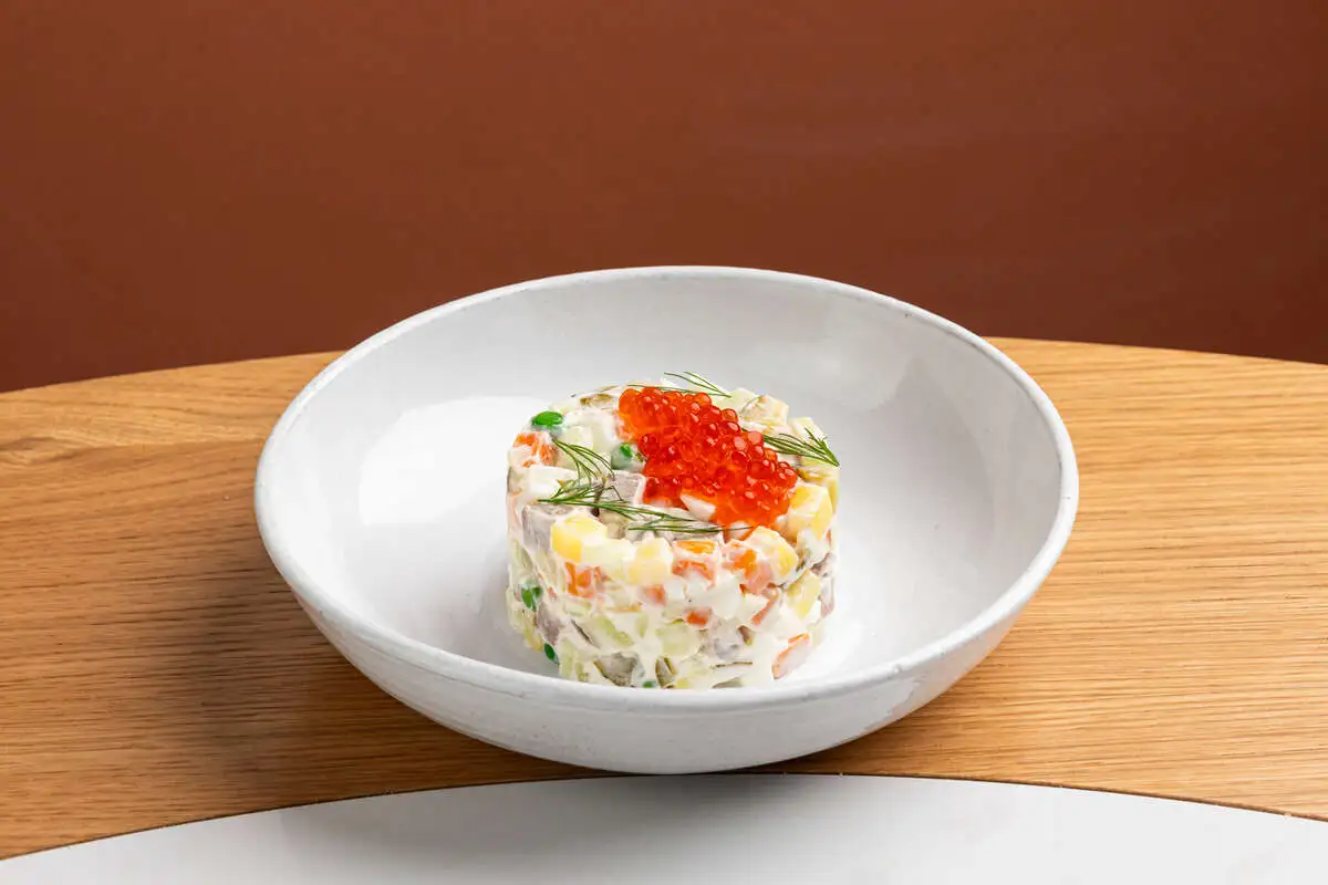 Оливье с языком и красной икрой