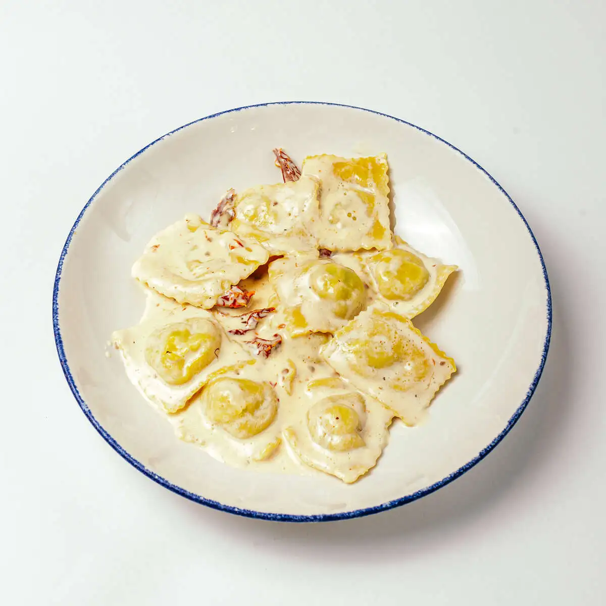 Равиолли с цыпленком и вешенками