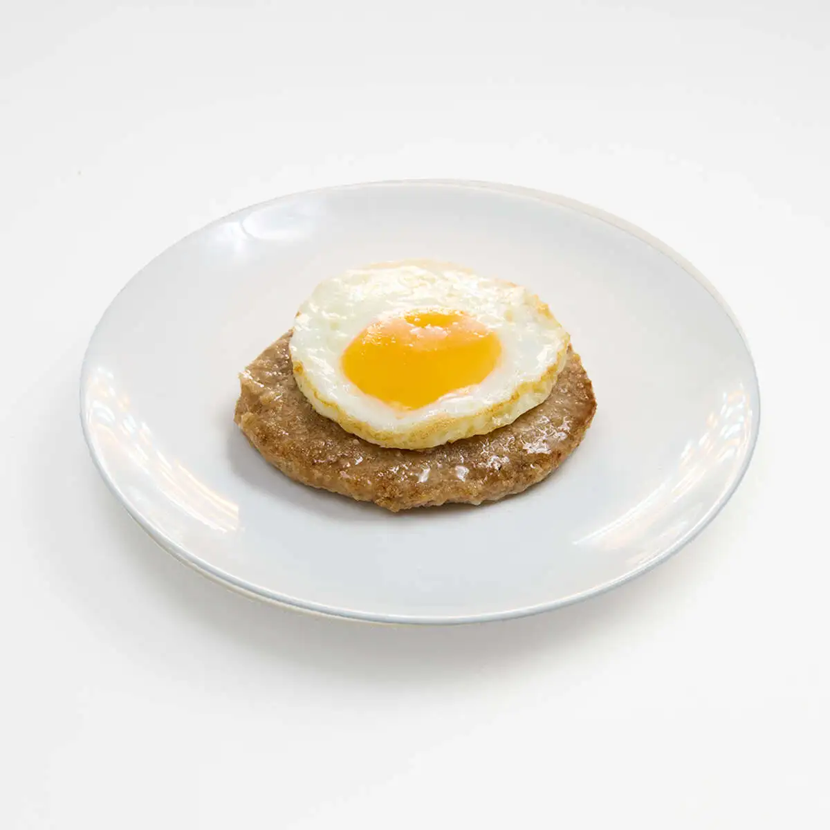 Бифштекс с яйцом свиной