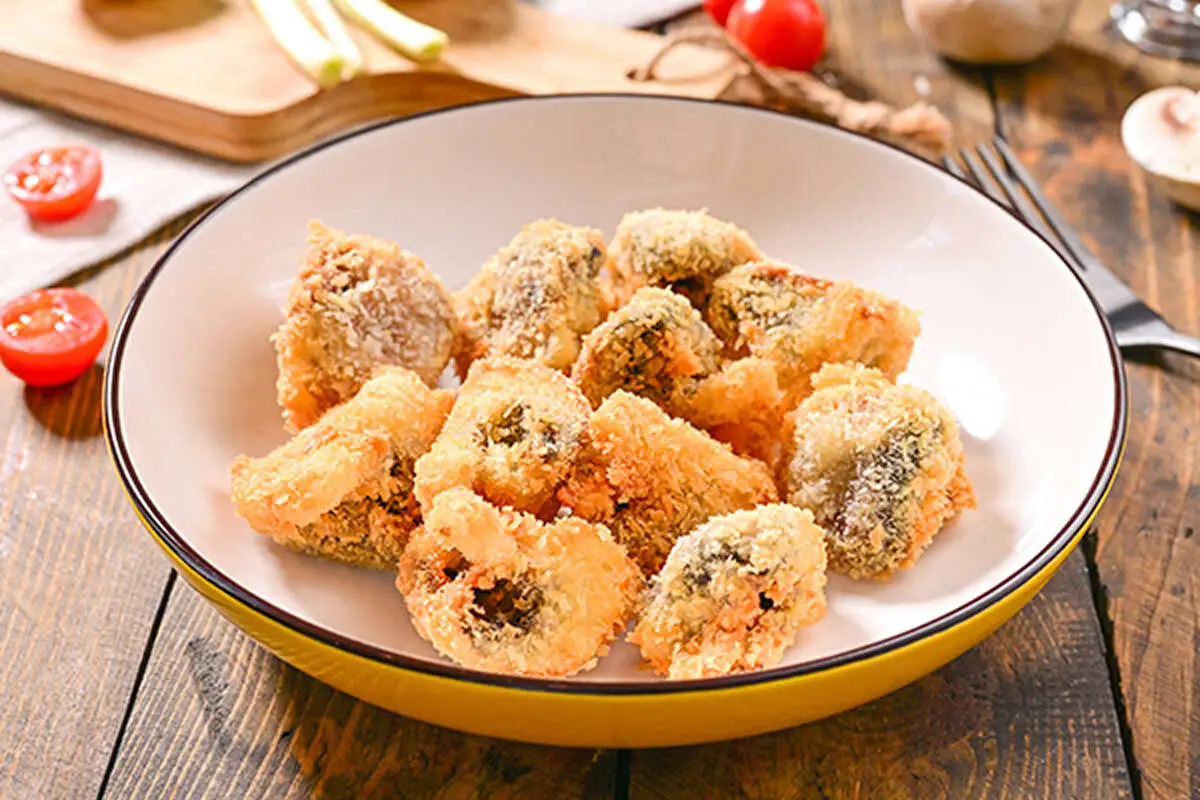 Шампиньоны в сухарях