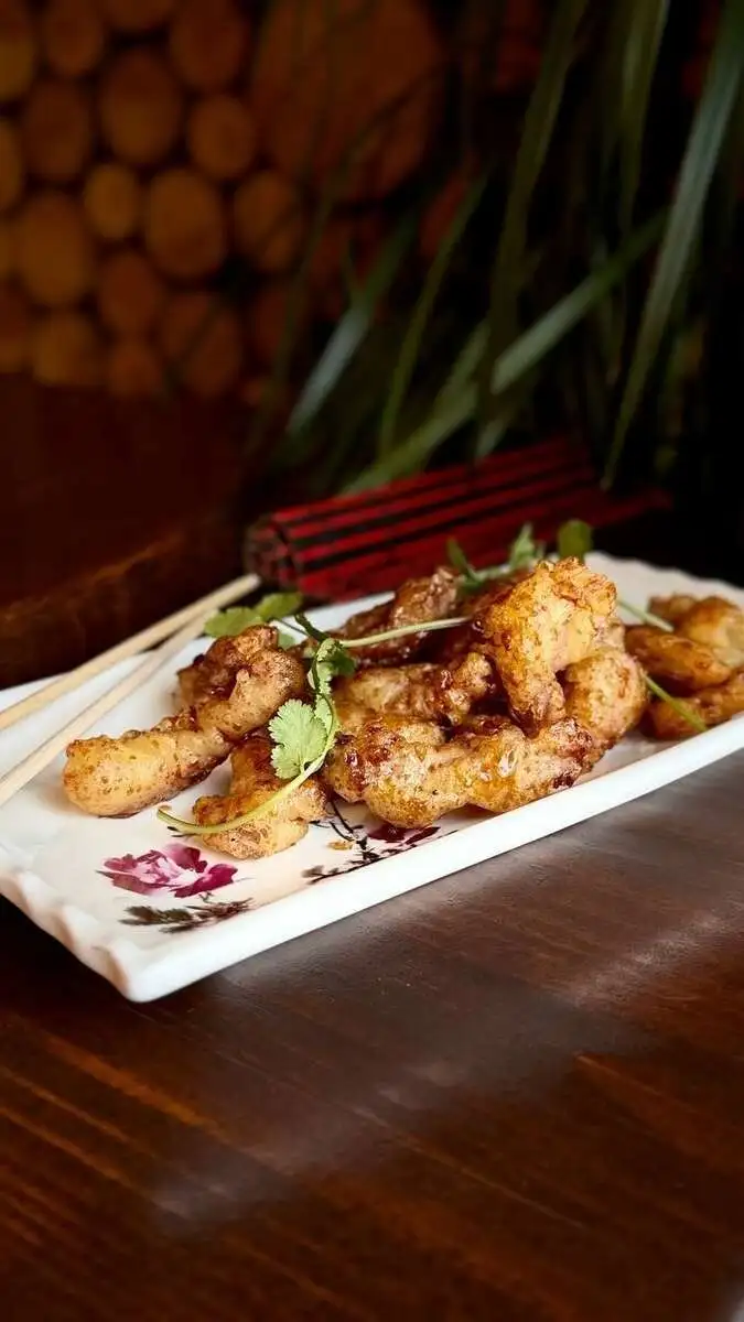 Хрустящая свинина в апельсиновом соусе