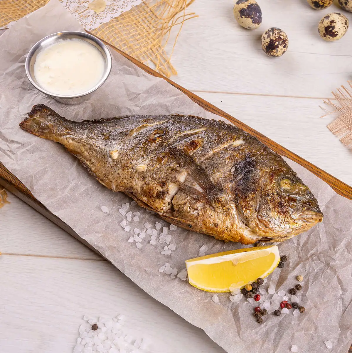 Дорадо гриль под лимонным соусом