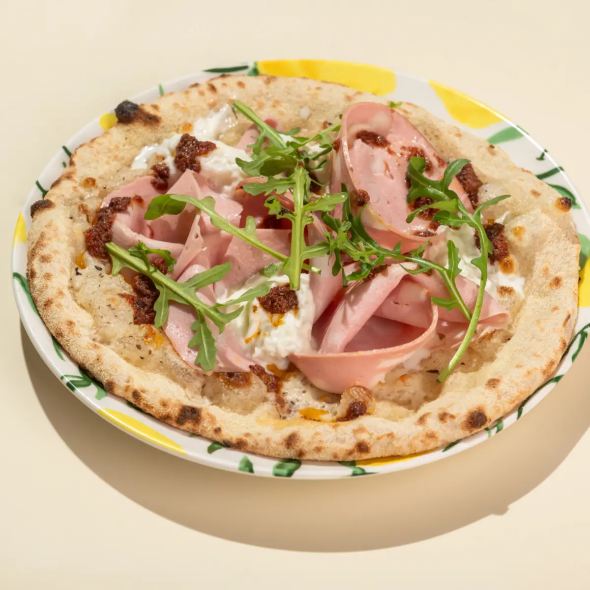 Лепешка с мортоделлой, страчателлой