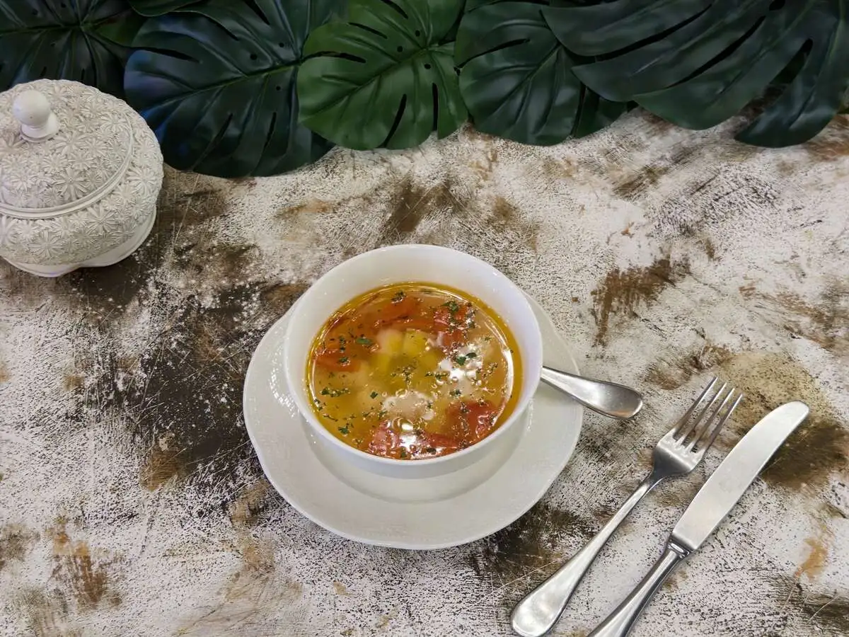 Уха с треской и томатами