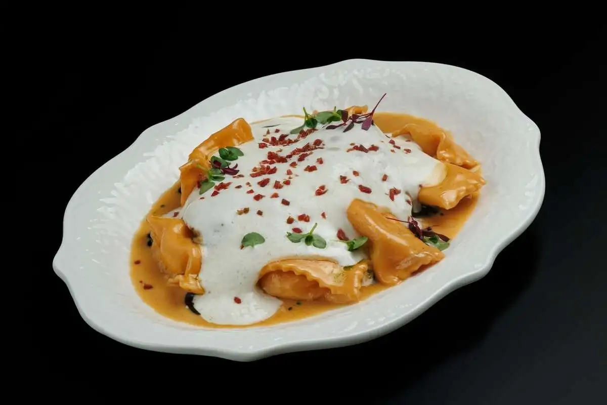 Вареники с четырьмя видами сыра и томленой уткой