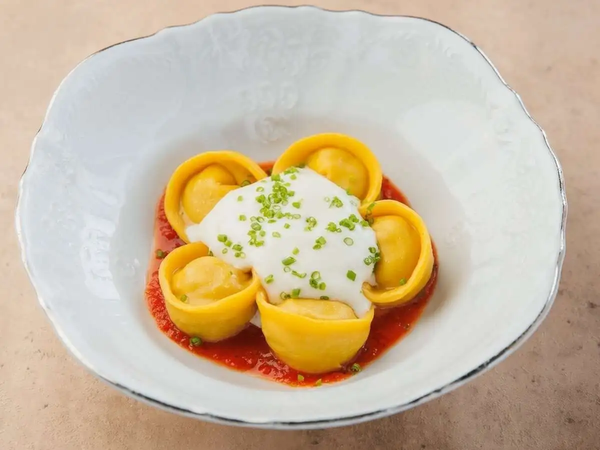 Пельмени с уткой и муссом из пармезана