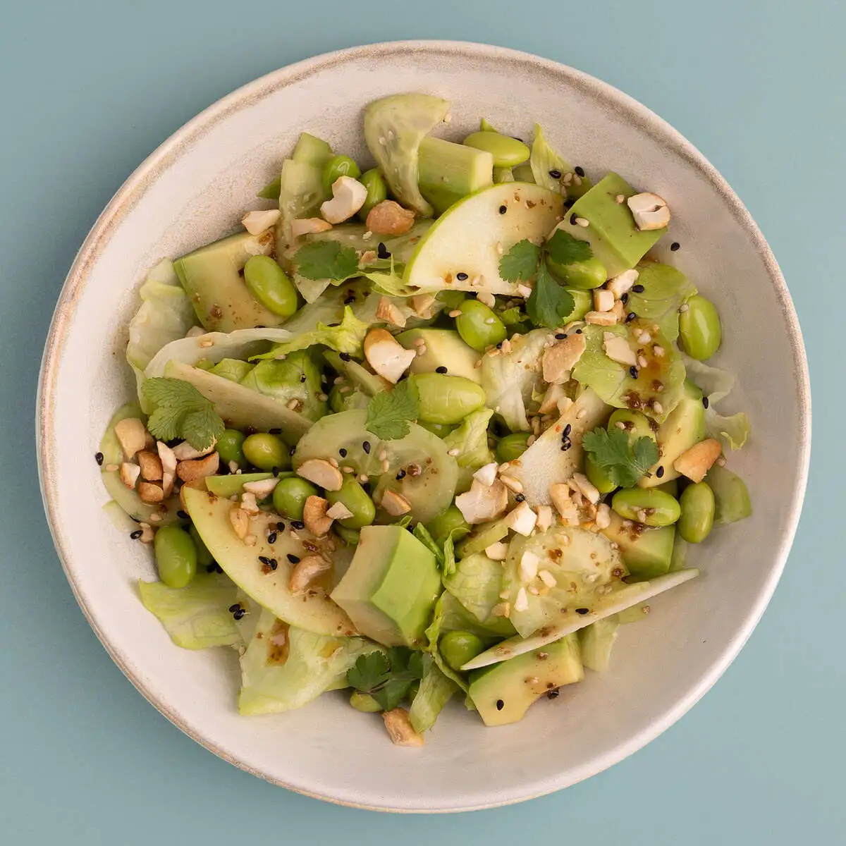 Green salad with avocado and truffle ponzu sauce