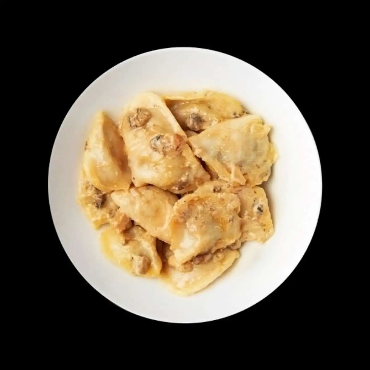 Вареники с картофелем и грибами с грибным соусом