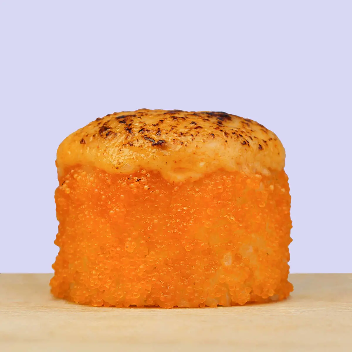 Baked with shrimp under spicy sauce